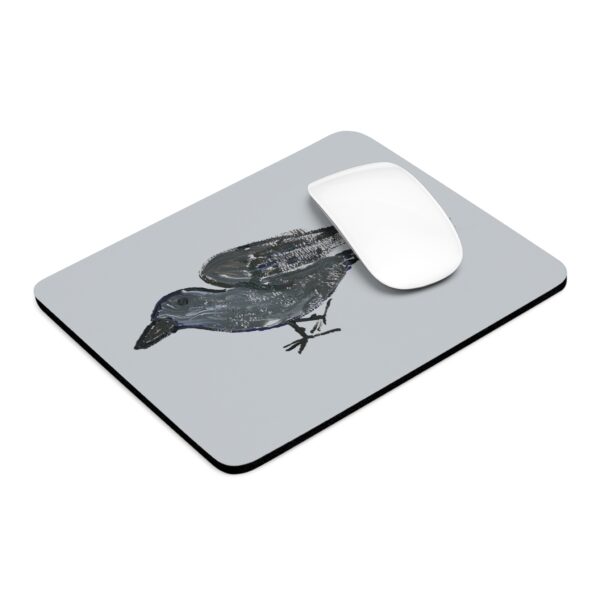 Mouse pad featuring a raven watercolor artwork by Paul Myrick