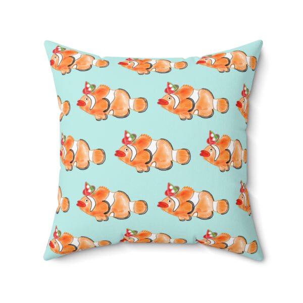 Clown fish watercolor throw pillow on light aqua background by Paul Myrick