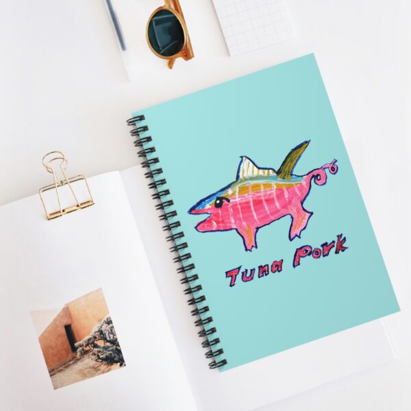 Colorful Tuna Pork watercolor creature on spiral-bound notebook