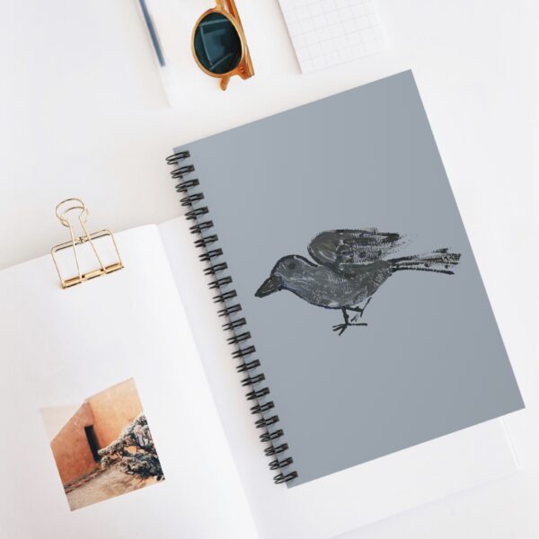 Raven watercolor artwork on a ruled line spiral notebook by Paul Myrick