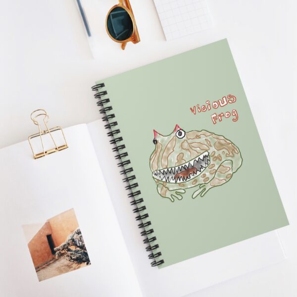Vicious Frog watercolor artwork on a light sage spiral notebook cover.