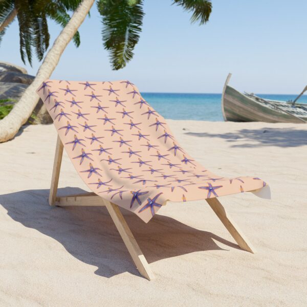 Crowned starfish watercolor beach towel on coral peach background by Paul Myrick