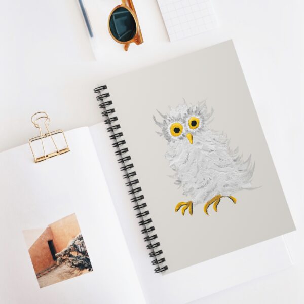 spiral ruled line notebook featuring Paul Myrick's white barn owl artwork on the cover
